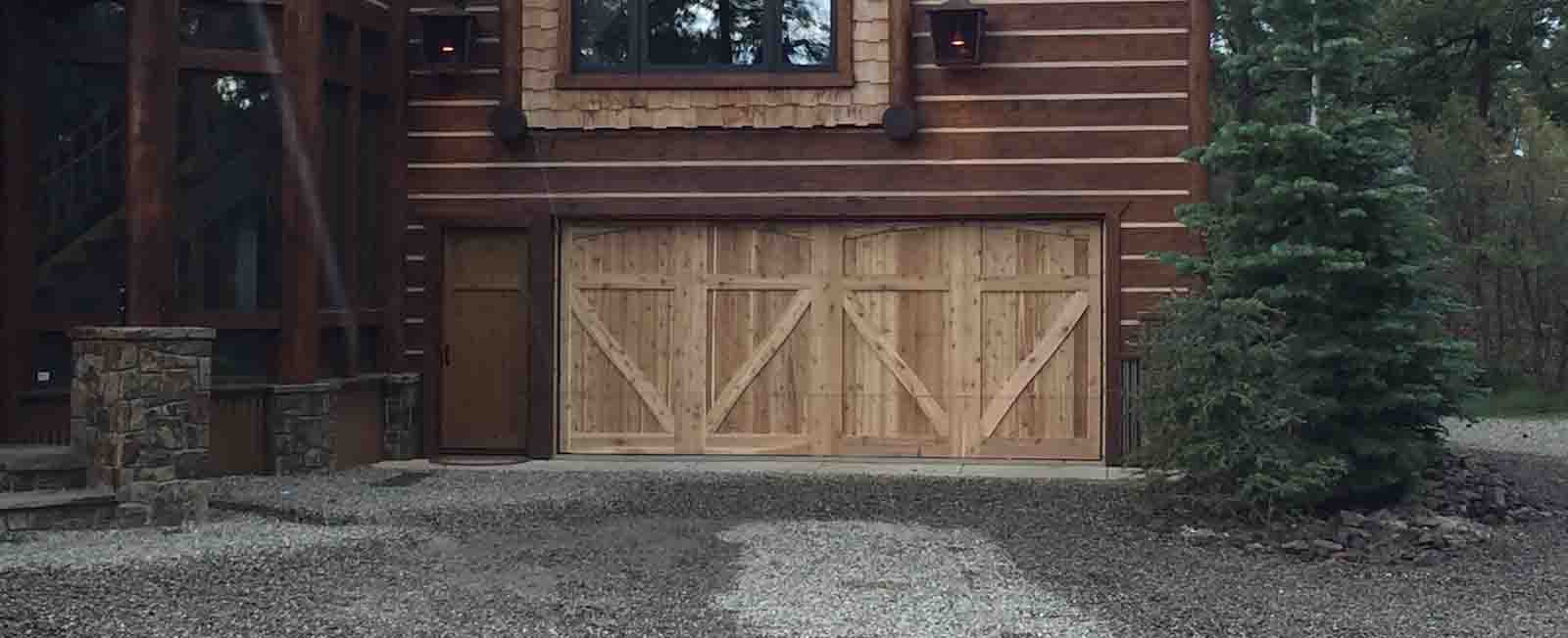 Custom garage door with an overlay installed by Bearfoot Garage Doors
