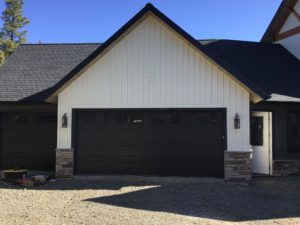 black garage doors with clear windows
